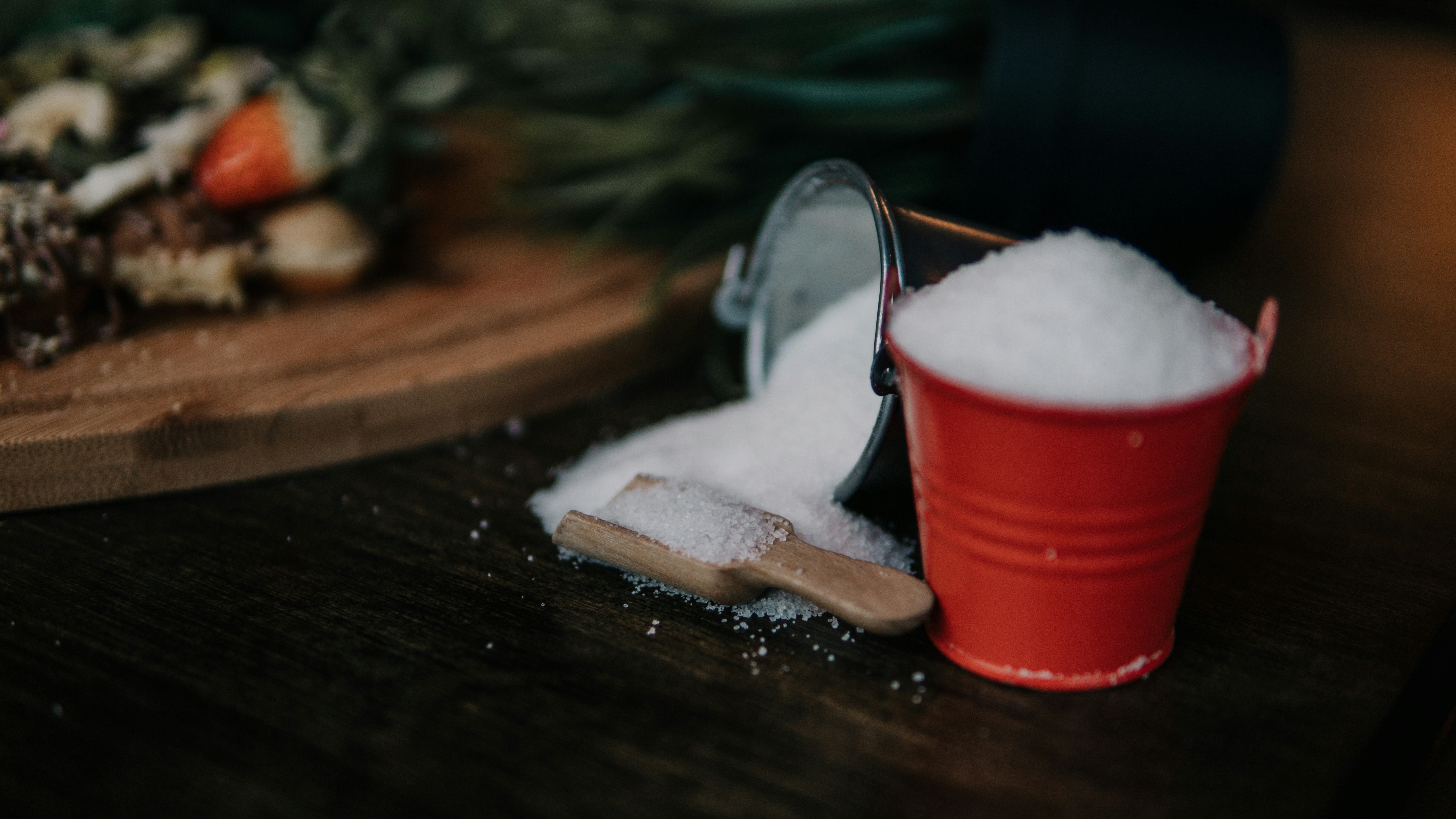 white powder in red metal bucket